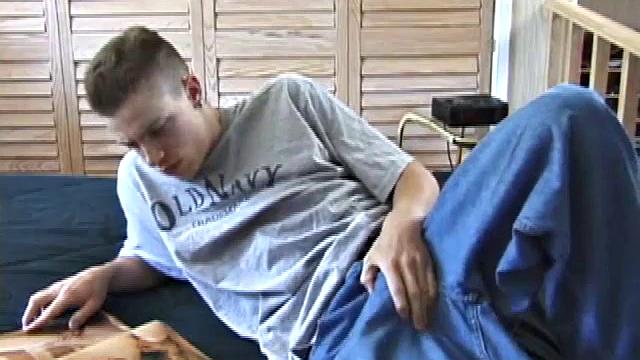 Shane is spending a lazy afternoon reading his favorite straight porn mag. He starts stroking his manhood slow till it's fully hard.
