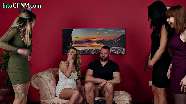 Строгие дамы раздевают мужчину и дрочат ему на глазах у всех.