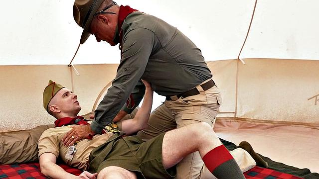 Newbie scout assfucked in doggystyle by DILF in tent