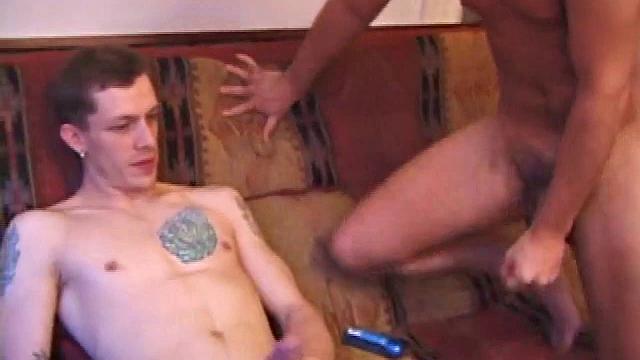 Shane and Devon are ready to put on a show so they strip off their clothes and get busy. After stroking themselves hard, Shane services Devon's cock until it's Devon's turn on Shane.