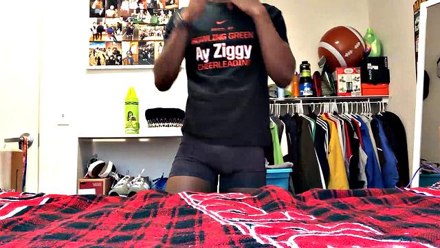 We find Chris in his bedroom, as he strips naked and quickly gets that big dick of his stiff and ready for stroking. Wearing nothing but a ball cap and sox, this young ebony stud is all over the room, while he chases a climax.