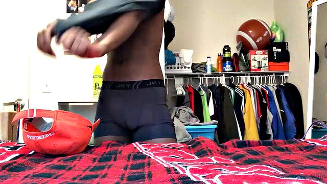 We find Chris in his bedroom, as he strips naked and quickly gets that big dick of his stiff and ready for stroking. Wearing nothing but a ball cap and sox, this young ebony stud is all over the room, while he chases a climax.