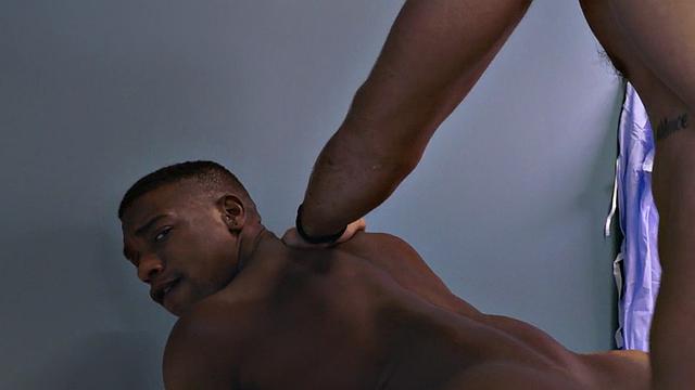 Sixpack patient breeded by sturdy doctor in office