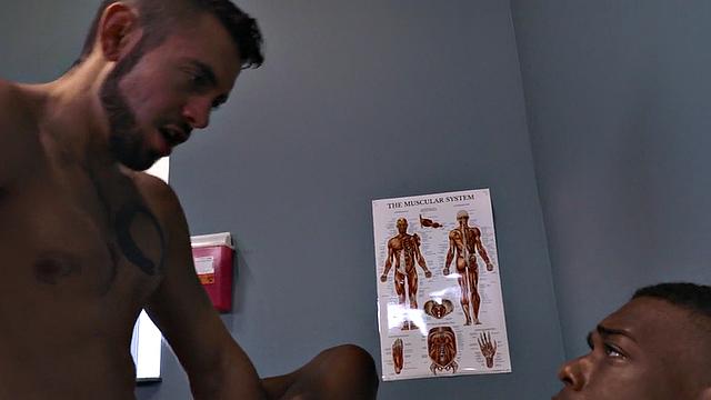 Sixpack patient breeded by sturdy doctor in office