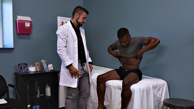Sixpack patient breeded by sturdy doctor in office