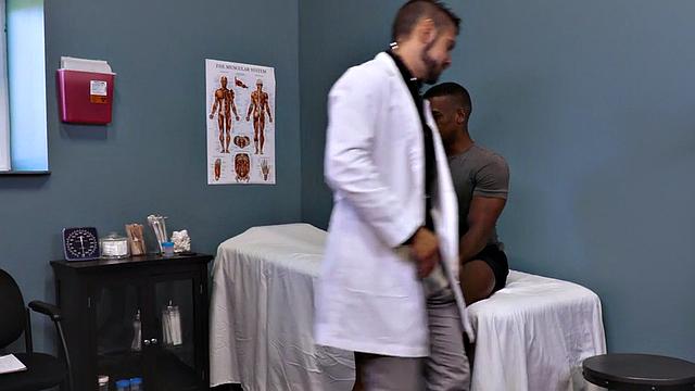 Sixpack patient breeded by sturdy doctor in office