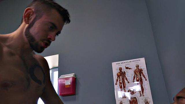 Sixpack patient breeded by sturdy doctor in office