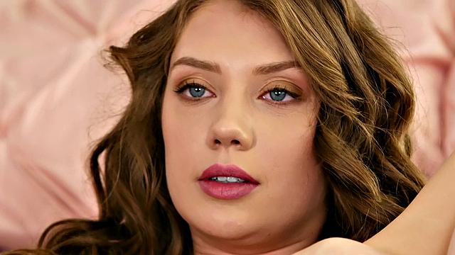 Get Cozy with Koshka: Curly-haired babe with small tits fingerbangs her bald pussy in the bedroom