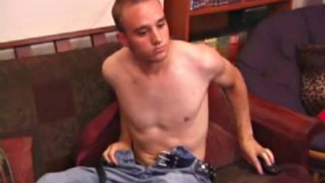 Ethan strips naked and strokes up a stif one, while watching a porn video. After lubing his asshole, he fingers himself and then inserts a dildo. Ethan gives his ass a good workout, before shooting a huge cum load onto his chest.