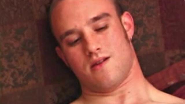 Ethan strips naked and strokes up a stif one, while watching a porn video. After lubing his asshole, he fingers himself and then inserts a dildo. Ethan gives his ass a good workout, before shooting a huge cum load onto his chest.