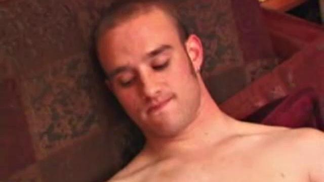 Ethan strips naked and strokes up a stif one, while watching a porn video. After lubing his asshole, he fingers himself and then inserts a dildo. Ethan gives his ass a good workout, before shooting a huge cum load onto his chest.