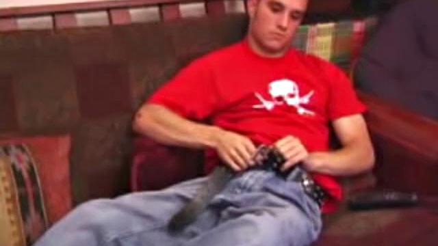 Ethan strips naked and strokes up a stif one, while watching a porn video. After lubing his asshole, he fingers himself and then inserts a dildo. Ethan gives his ass a good workout, before shooting a huge cum load onto his chest.