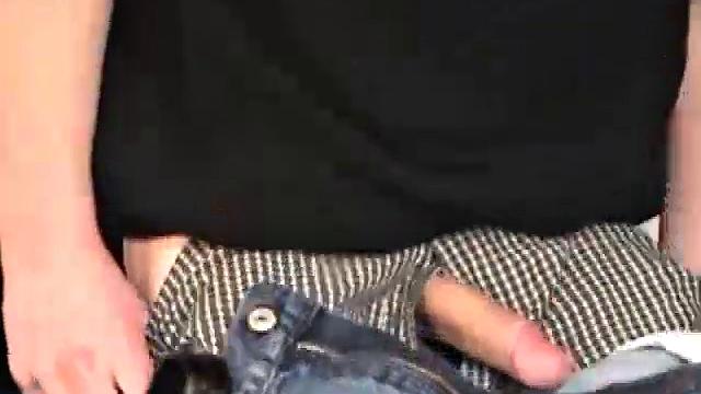 Seated in front of his computer, Darrell works his cock, pulls it out, jerks off with determination, grabs a wine glass, and dumps his warm cum into it.