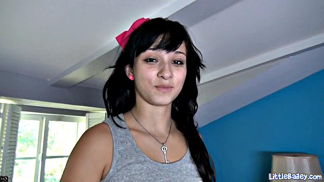 Sexy teen Bailey goes solo on her pussy