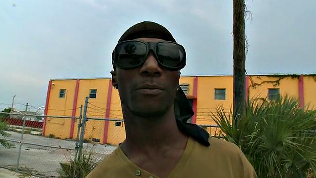 A BBC stud get his bare ass pounded by a massive white cock in a wild interracial parking lot