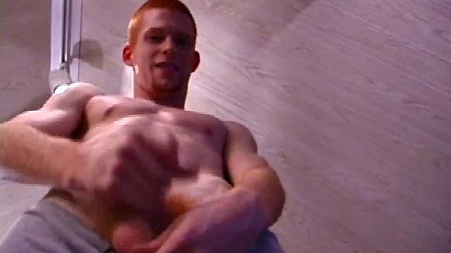 Tristian grabs his balls and strokes his long cock with determination. He kneels down before us and sticks his cock in the camera. Standing back up, Tristian continues to jerk off, until he asks if we want it on our face.