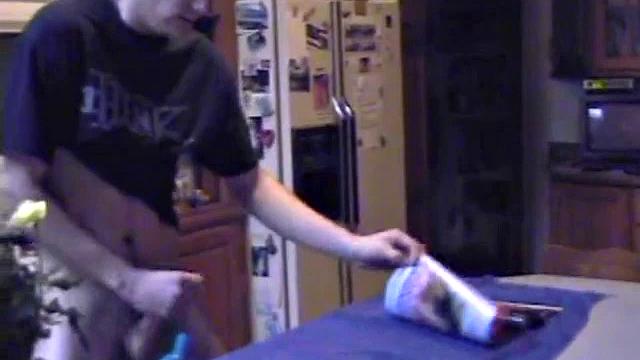 Ric brings a porn magazine, lube, and a towel to rip one off. After pulling out his hard dick and flipping through girlie magazines, Ric lets a helping hand tpuch him.