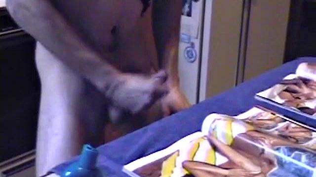 Ric brings a porn magazine, lube, and a towel to rip one off. After pulling out his hard dick and flipping through girlie magazines, Ric lets a helping hand tpuch him.