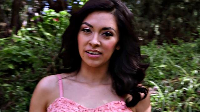 Beautiful brunette Kara is a nervous 20something who does a striptease and a masturbation show outdoors.