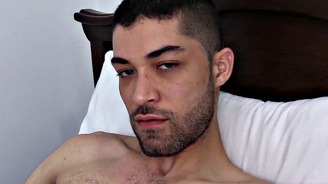 We find Adam stripped to his underwear and kicked back on a bed. He quickly works up a stiff one and pulls it out the leg of his briefs. After playing with it for a while, Adam gets completely naked and shoves a toy u his Latin ass.