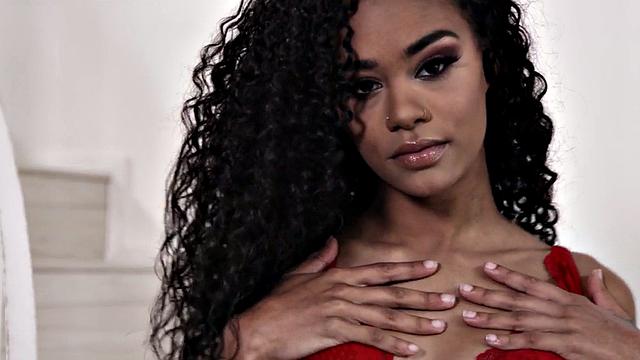 Curly-haired ebony babe with a pierced pussy gets pounded doggystyle after giving head to hung partner