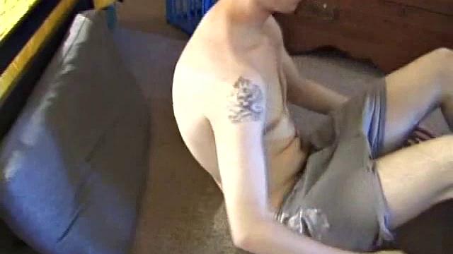 After using the remote to cue up a porn video, Derek massages his crotch to wake up his monster. Once the clothes are off he starts to stroke and it doesn't take long for Derek to cum all over his hairy stomach.