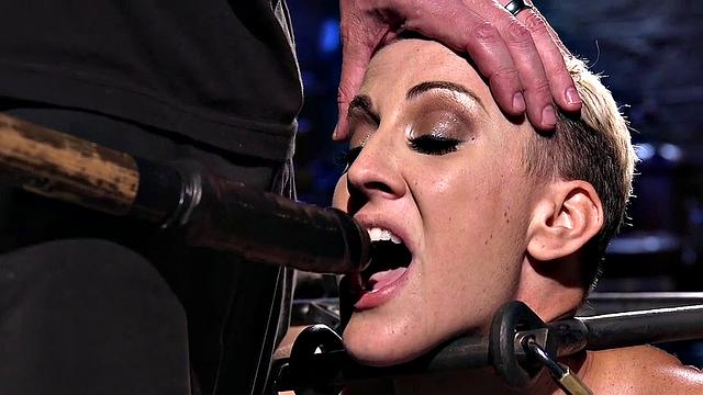 BDSM sub bound to floor and toyed with dildo and vibrator