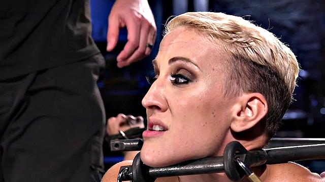 BDSM sub bound to floor and toyed with dildo and vibrator