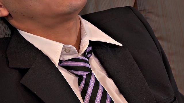 Suited Latino hosting threeway