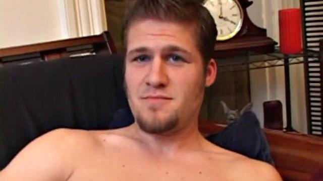 Straight Alex West is turned on by the porn that's playing and quickly gets a stiff one. As he strokes his cock, Alex stuffs his butt with a dildo and busts a load onto his belly.