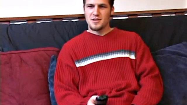 Straight Alex West is turned on by the porn that's playing and quickly gets a stiff one. As he strokes his cock, Alex stuffs his butt with a dildo and busts a load onto his belly.