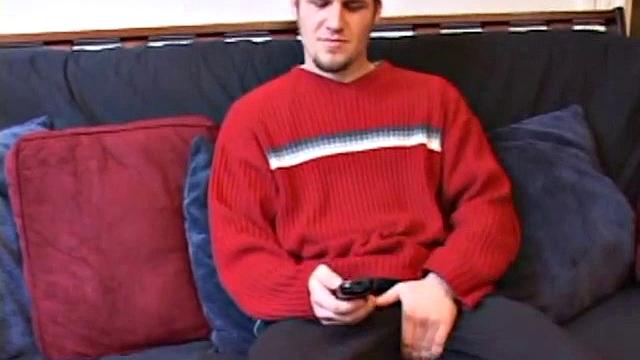 Straight Alex West is turned on by the porn that's playing and quickly gets a stiff one. As he strokes his cock, Alex stuffs his butt with a dildo and busts a load onto his belly.