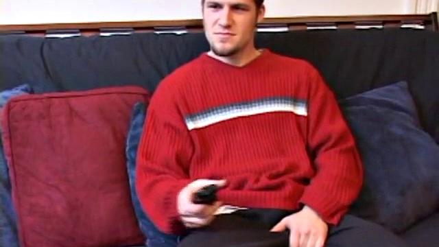 Straight Alex West is turned on by the porn that's playing and quickly gets a stiff one. As he strokes his cock, Alex stuffs his butt with a dildo and busts a load onto his belly.