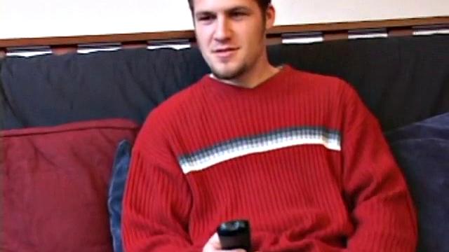 Straight Alex West is turned on by the porn that's playing and quickly gets a stiff one. As he strokes his cock, Alex stuffs his butt with a dildo and busts a load onto his belly.