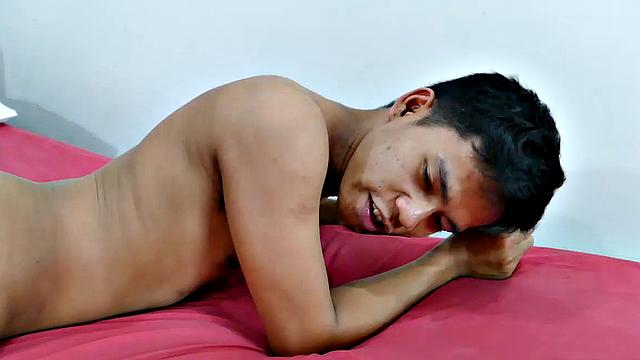 Cute young Asian twink Marcon has Freddy's foot in his mouth, sucking toes and licking his soles while Freddy is doing the same. The two gay Asian boys are in a foot fetish sixty-nine and enjoying every moment.