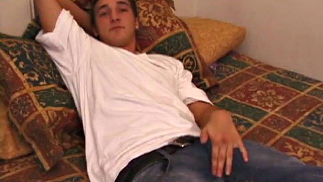 Race Banner has that hot bad boy look that so many like. He's stretched out on a bed, watching a porn clip and rubbing his fast growing tent pole. His shirt comes off and he slides a hand inside his pants to pull at the boner inside.