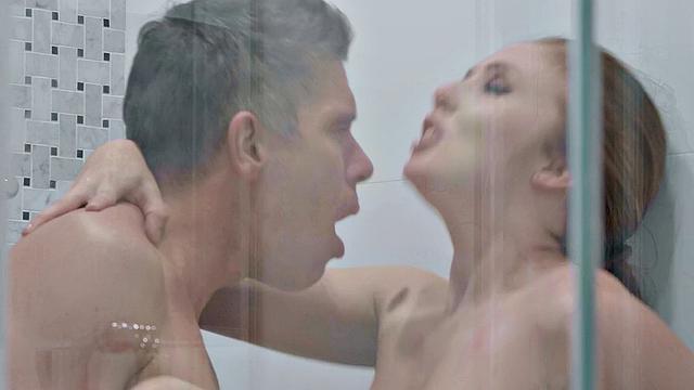 Blonde bombshell gets a big dick in every hole in this steamy shower sex tape
