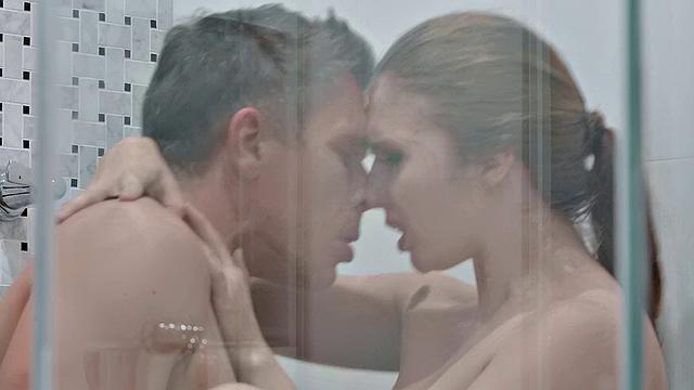 Blonde bombshell gets a big dick in every hole in this steamy shower sex tape