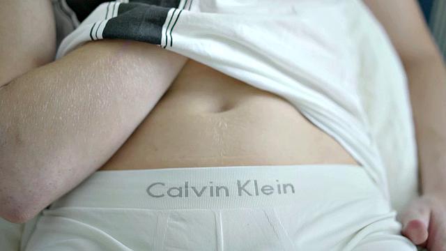 Lean twink wanking hard cock before cumming