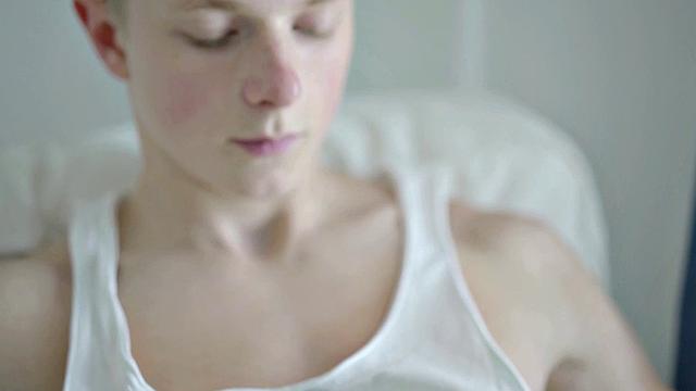 Lean twink wanking hard cock before cumming