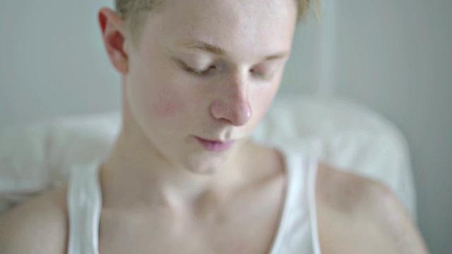 Lean twink wanking hard cock before cumming