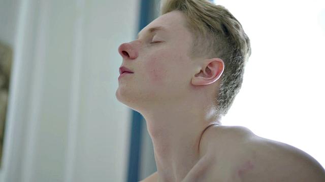 Lean twink wanking hard cock before cumming