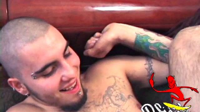 Gay boy Chase and Straight boy Rock massage their dicks while watching a porn video. Chase leans over to suck Rock's hard cock, and Rock loves it so much that he cums all over Chase's face. Rock isn't finished.