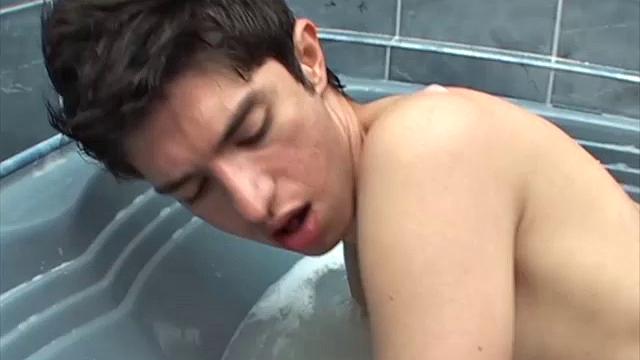 Marcos has George right where he wants him, naked in a bubble bath. Or is it the other way around? In any case, George is no stranger to big raw cocks up his skinny little ass and this Latin twink is about to go a round with big boy.