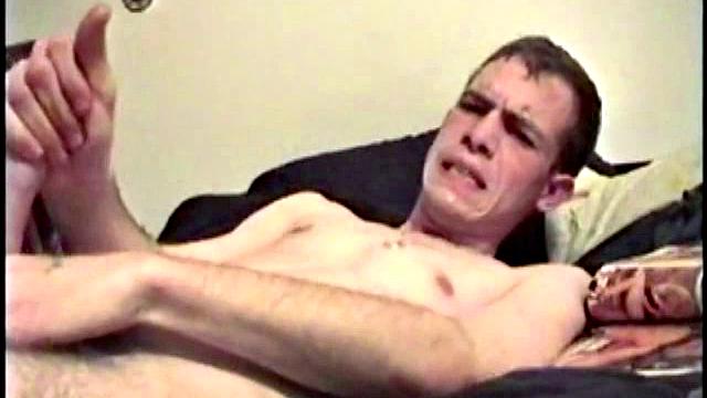 Putting his hairy ass and balls in our face, Nate gets himself hard, with a little help from some porn magazines. The young man kneels over his porn, and a box, with a pillow tucked between his legs.