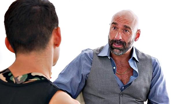 Fisting daddy with tattoos fists stud in military harness