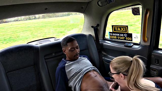 Lucky dude gives head in backseat while riding his car's reverse cowgirl