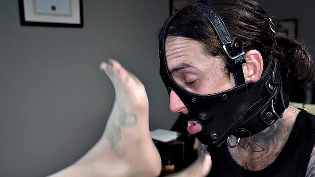 Femdom busty MILF in stockings whipping foot sub