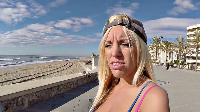 Blonde beach babe with big ass rides cock in public in duo