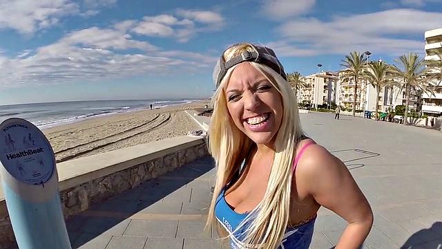 Blonde beach babe with big ass rides cock in public in duo